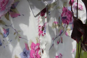 fancy stitching on the button stand